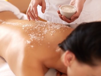 Lady receiving a Full Body Exfoliation in Stockton, CA