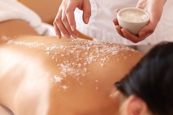 Lady receiving a Full Body Exfoliation in Stockton, CA