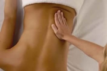Lady receiving a Myofascial Release (MFR) Massage in Stockton, CA