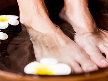 Man receiving an ionic detox foot bath in Stockton, CA