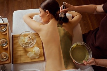 Lady receiving a Seaweed Wrap Treatment in Stockton, CA